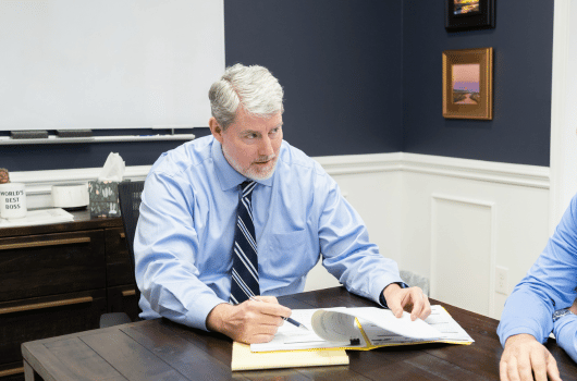 Charleston Area Bankruptcy Lawyer Russ DeMott meeting with client