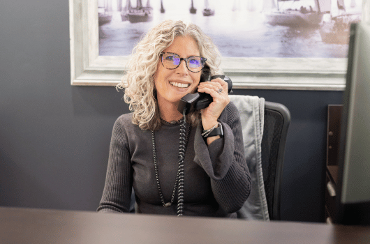 Legal Assistant Jennifer Answering Phone at Charleston Bankruptcy Law Firm