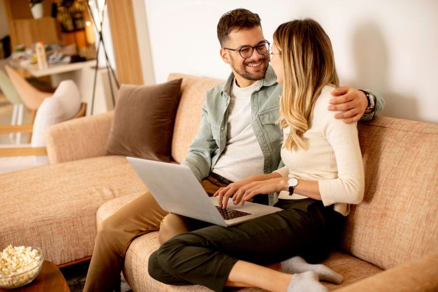 Unmarried couple filling out estate planning documents