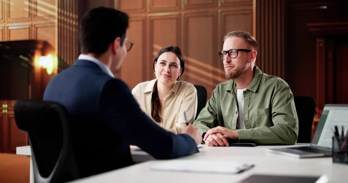 Family meeting with an estate planning attorney to establish a Revocable Living Trust, allowing a successor trustee to manage trust assets if the grantor loses capacity due to Alzheimer's or dementia.